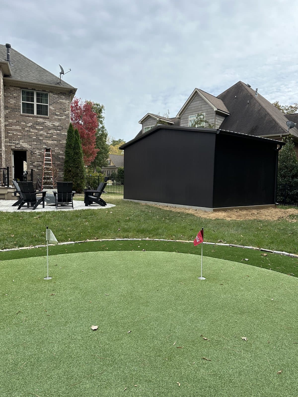 GSR outbuilding with backyard putting green